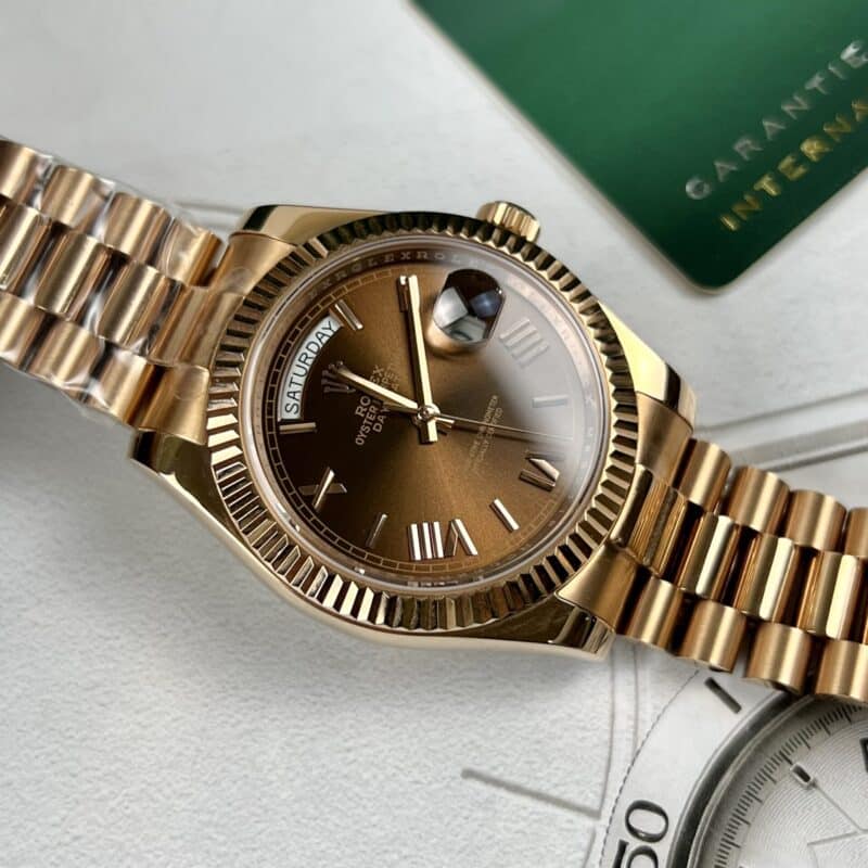 ĐỒNG HỒ ROLEX DAY-DATE MẶT CHOCOLATE CỌC SỐ LA MÃ FAKE 1:1 EW FACTORY