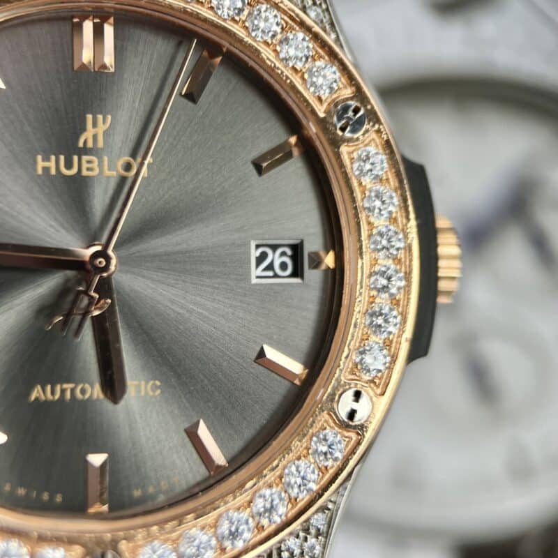 ĐỒNG HỒ HUBLOT CLASSIC FUSION MẶT XÁM NIỀNG VÀNG HỒNG ĐÍNH KIM MOISSANITE